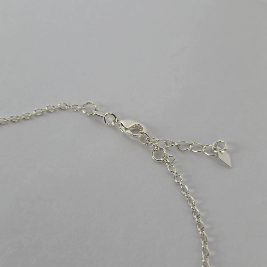 Tobillera Manos de Fátima Caladas con Delfín en Plata 925