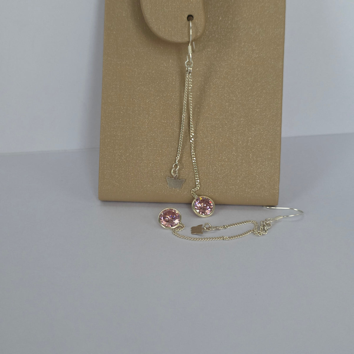Aros Colgantes Mariposas con Microcircón Rosado en Plata 925