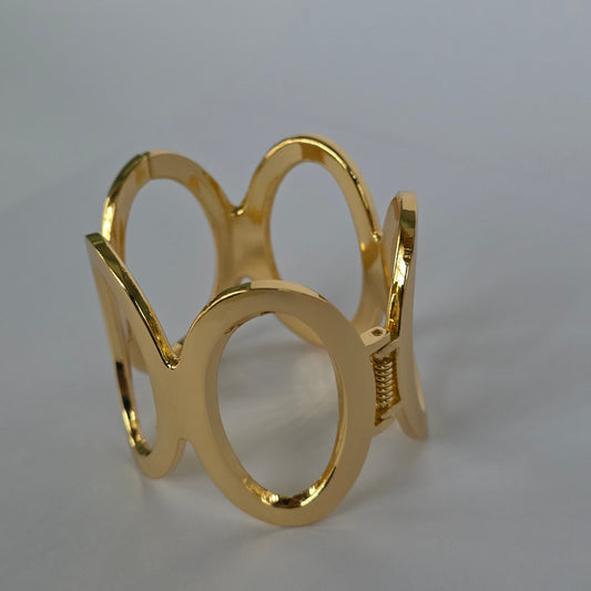 Pulsera Rígida Aros Calados Geométricos – Baño de Oro 18K — Joyería BomLeón