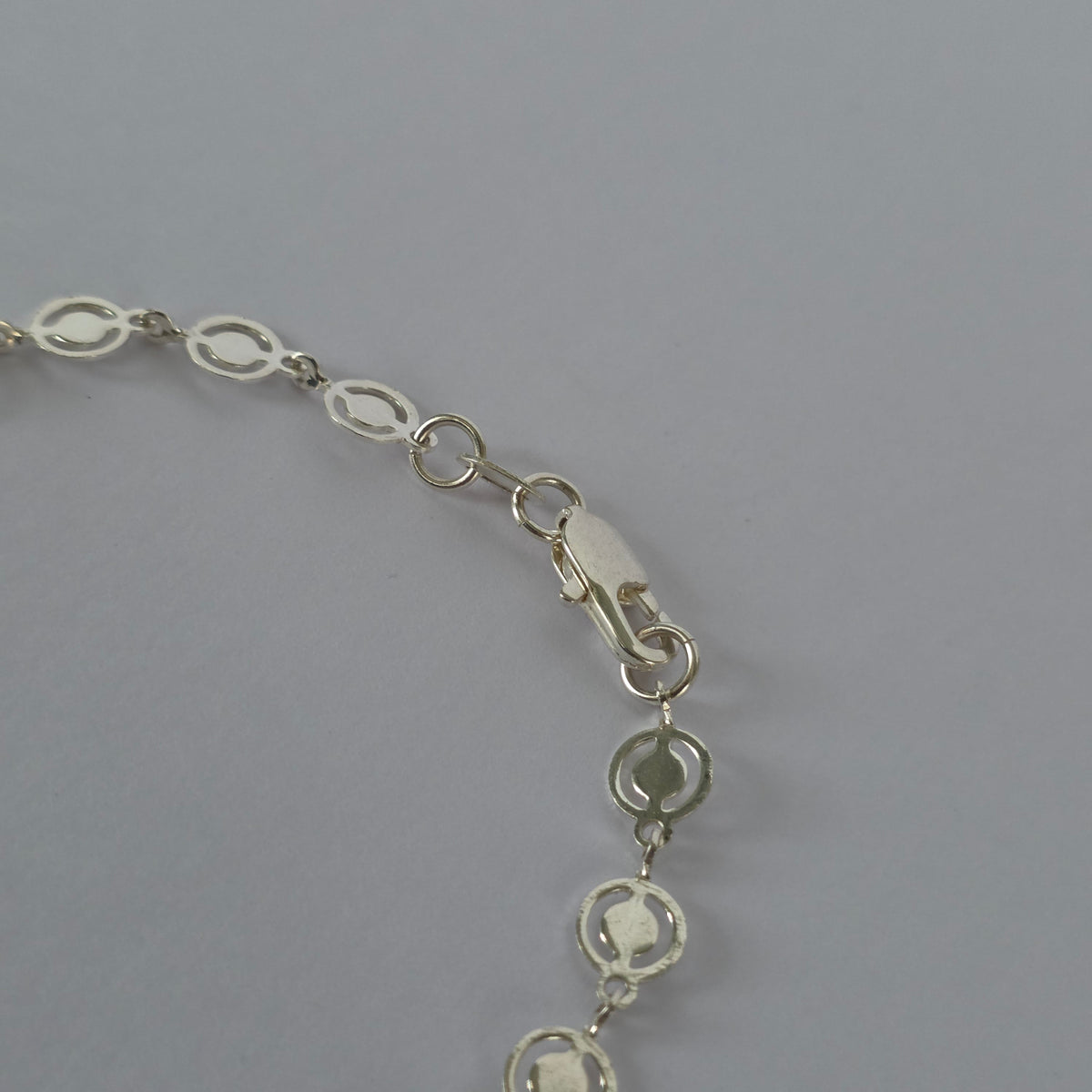 Pulsera de Círculos Calados con Centro Liso en Plata 925