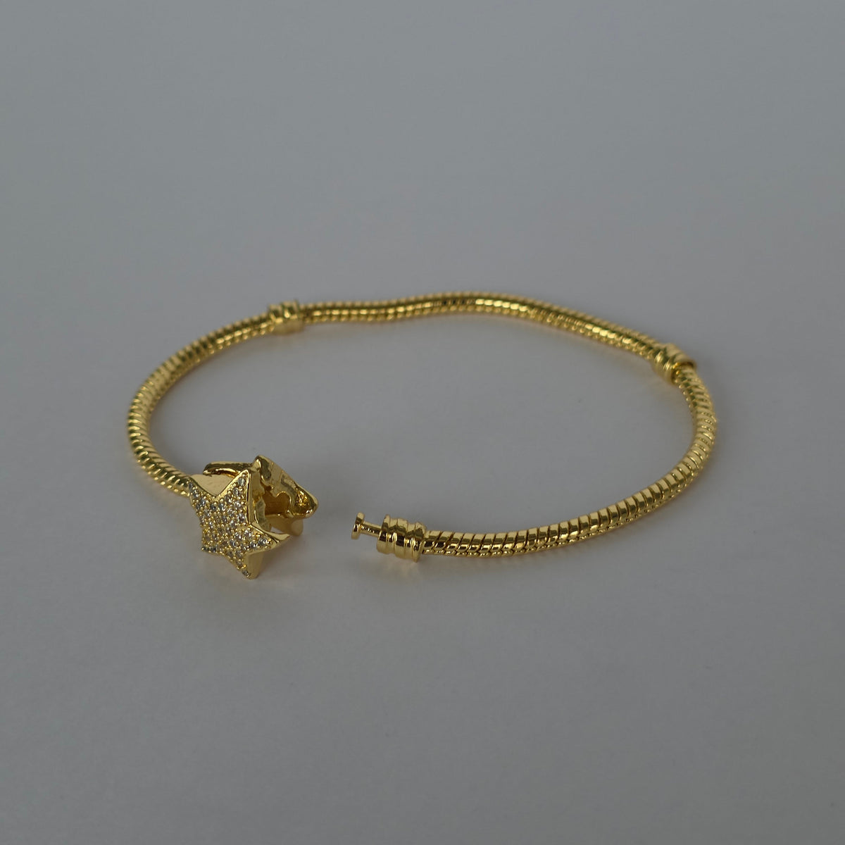 Pulsera Snake Chain Estrella Microcircones – Baño de Oro 18K — Joyería BomLeón