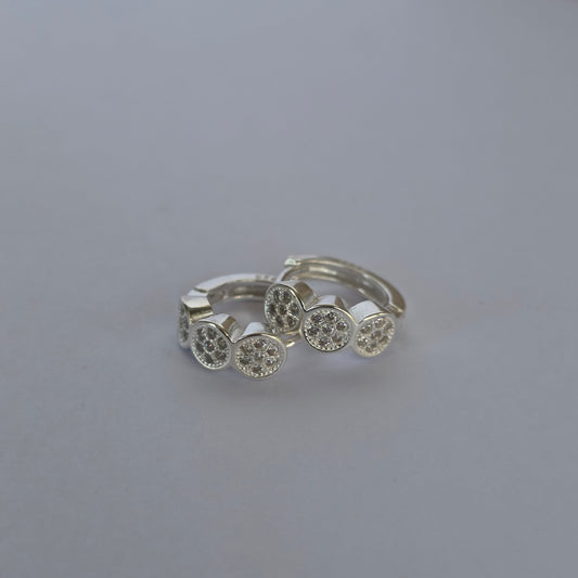 Comprar Aros Argolla Triple Círculo con Microcircones Transparentes en Plata 925 - Joyería BomLeón Chile