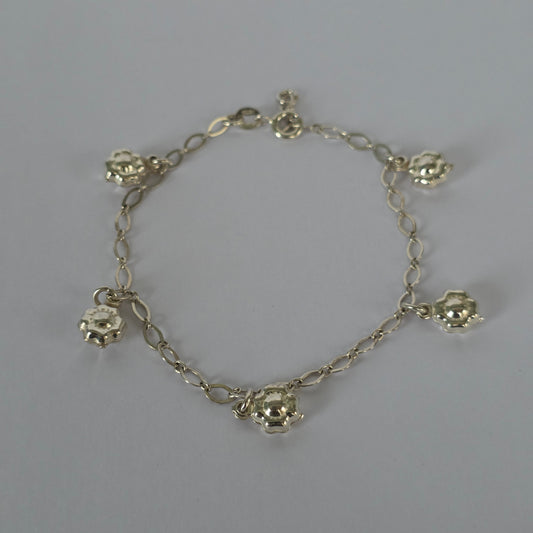 Pulsera de Dijes Florales con Eslabones Ovalados en Plata 925
