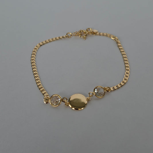Pulsera Cadena Grumet con Dije Redondo y Microcircones – Baño de Oro 18K — Joyería BomLeón