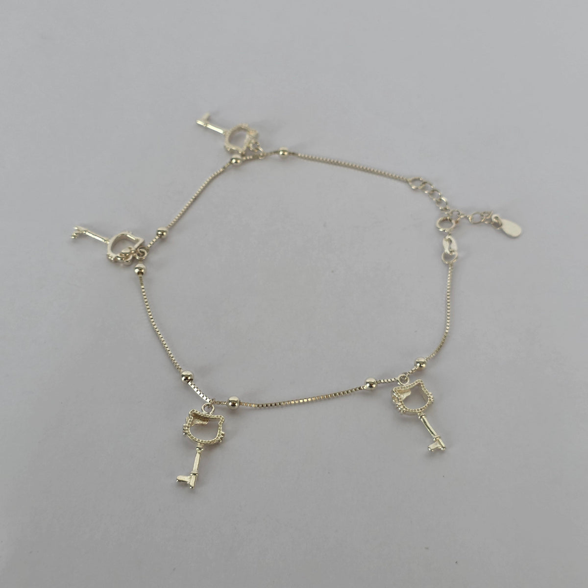 Tobillera Llaves con Silueta de Gatita en Plata 925