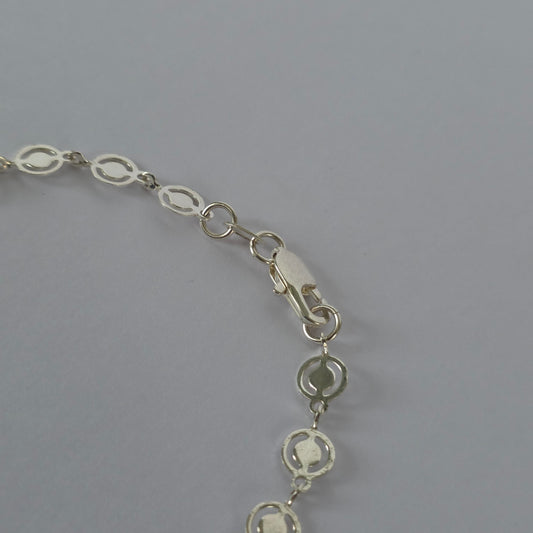 Pulsera de Círculos Calados con Centro Liso en Plata 925