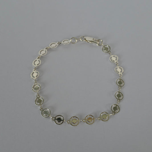 Pulsera de Círculos Calados con Centro Liso en Plata 925