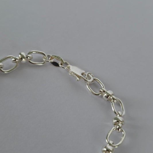 Pulsera de Eslabones Ovalados con Uniones Decorativas en Plata 925